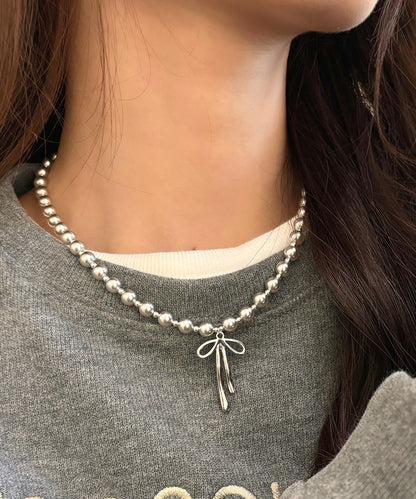 Fine Silk Stainless Steel Pearl Bow Pendant Necklace Wq029