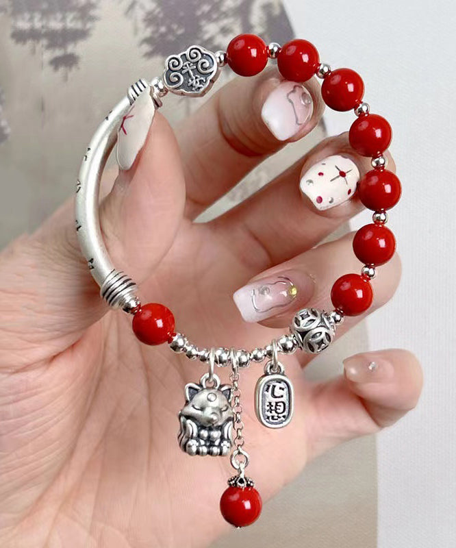 Mulberry Sterling Silver Cinnabar Tassel Charm Bracelet Kx1048