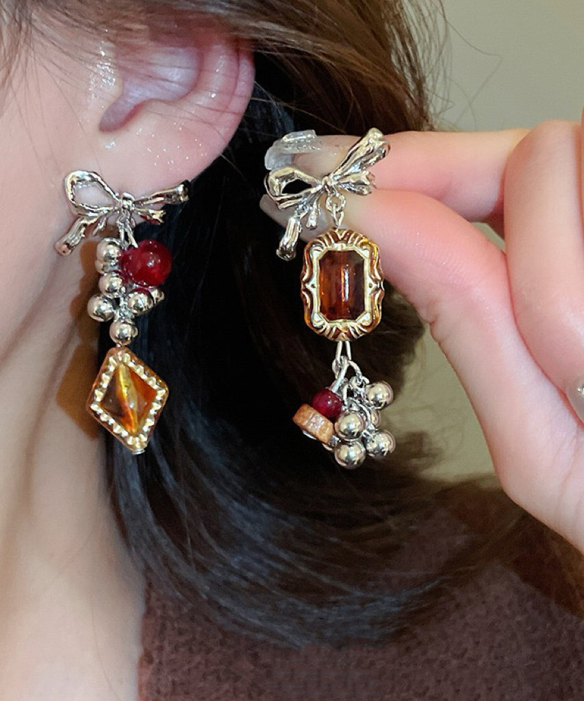 Acrylic Alloy Asymmetrical Amber Bow Tassel Drop Earrings
