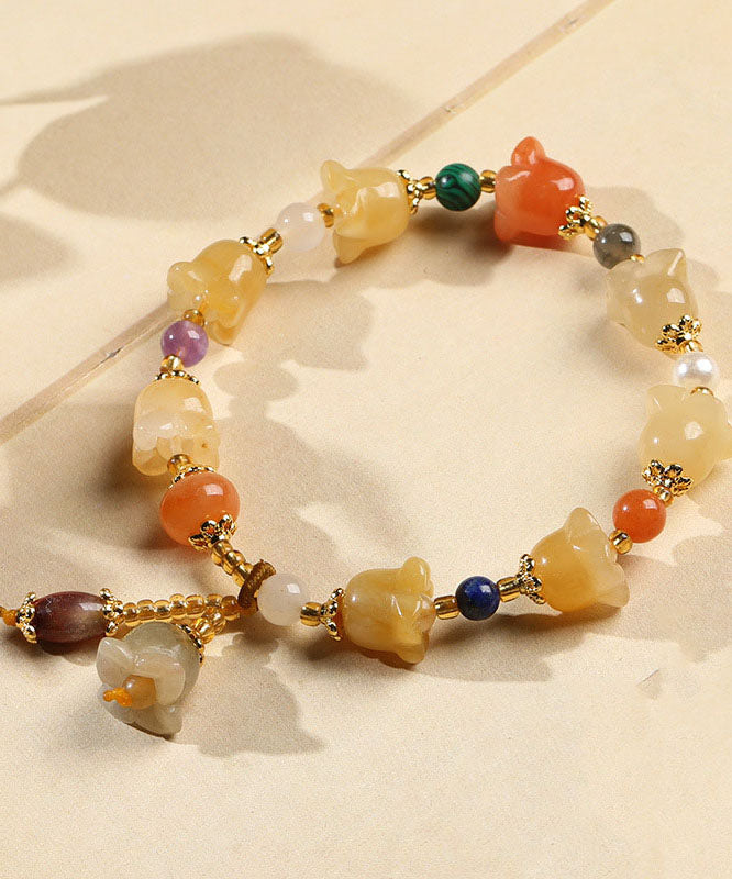 Golden Silk Jade Lily of the Rings Charm Bracelet