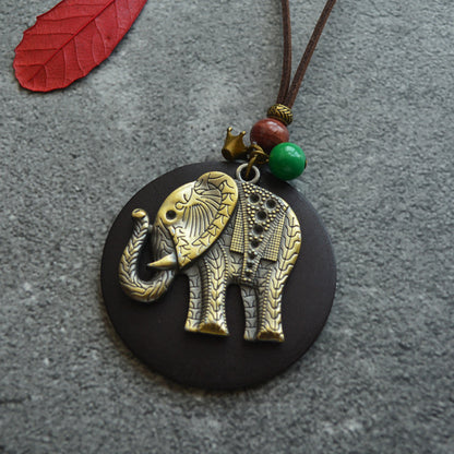 Art Wood Chip Bronze Elephant Necklace